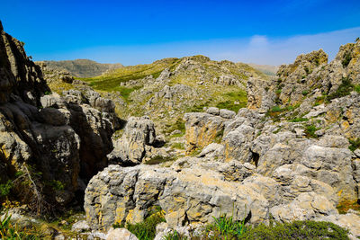 Scenic view of rocky mountains against sky