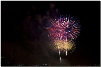 Low angle view of firework display