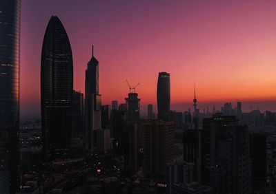 High angle view of city at sunset