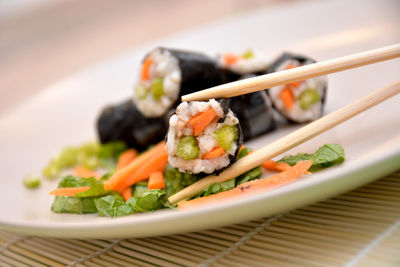 Close-up of sushi served in plate