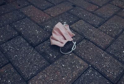 High angle view of person holding umbrella on street