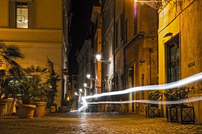 Buildings in city at night