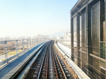 High angle view of railroad track on bridge