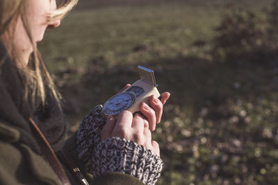 Close-up of woman using mobile phone