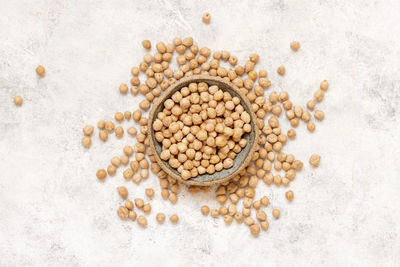 Directly above shot of bread on white background