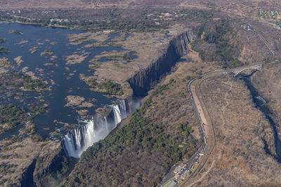 High angle view of dam on road by mountain