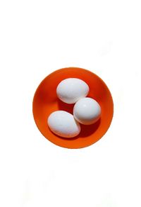 Directly above shot of orange over white background