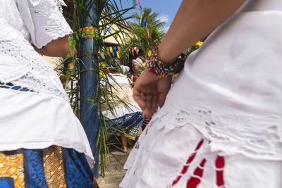 Members of the candomble religion gathered in traditional clothing 