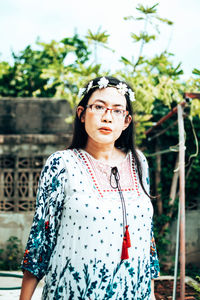 Portrait of a young woman looking away