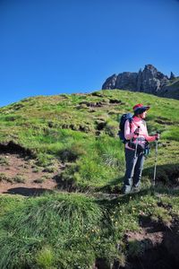 Hiking among amazing rocks of dolomite mountains in italy