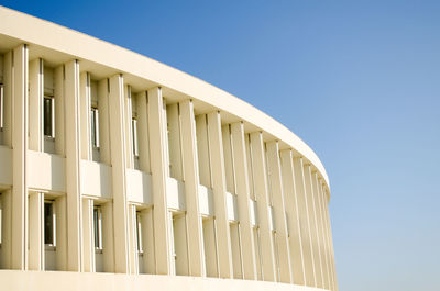 Low angle view of building against clear blue sky