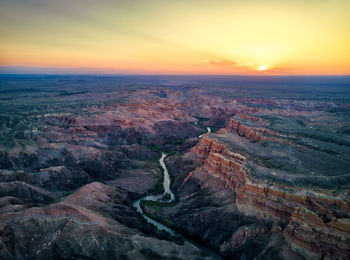 Aerial view of landscape during sunset