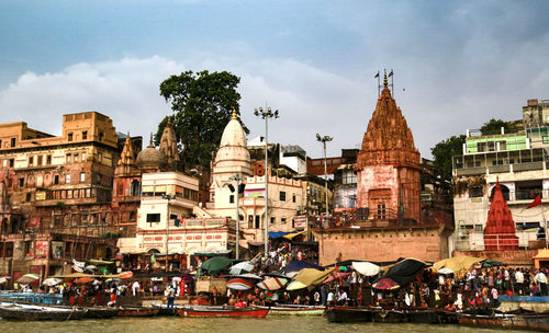 Group of people in front of buildings in city