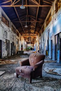 Old chair in abandoned building