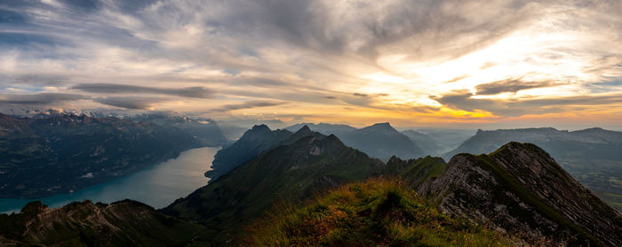 Scenic view of mountains against sky during sunset