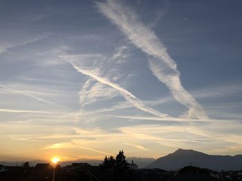 Low angle view of silhouette mountains against sky during sunset