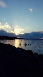 Scenic view of sea at sunset