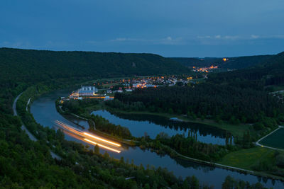 High angle view of illuminated buildings in city against sky