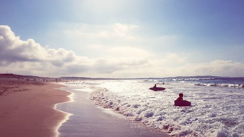 Scenic view of beach against sky