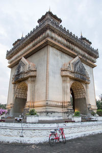 View of historical building against cloudy sky