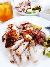 Close-up of meat on barbecue grill