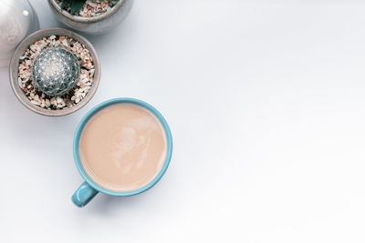 High angle view of coffee cup on table