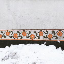 Close-up of snow on retaining wall