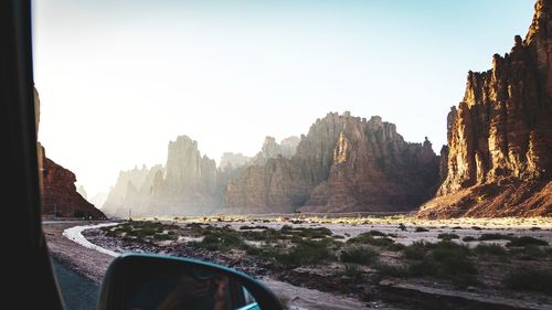 Panoramic view of road and mountains against sky