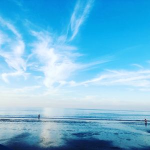 Scenic view of sea against blue sky