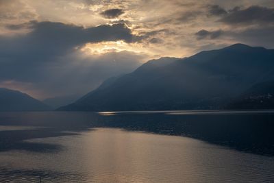 Scenic view of lake against sky during sunset