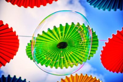 Low angle view of multi colored umbrellas