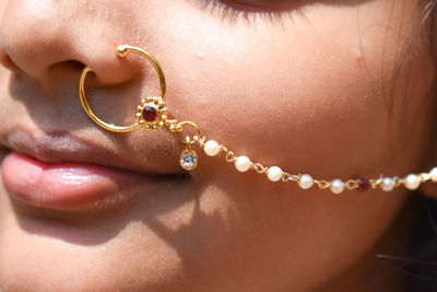 Close-up of girl wearing nose ring