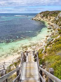 High angle view of stairway leading towards sea