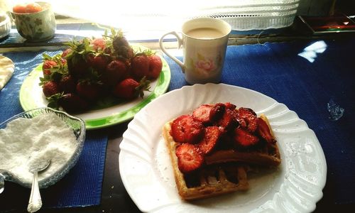 Close-up of breakfast served on table