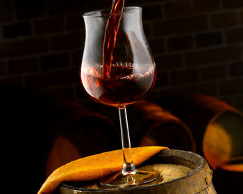 Close-up of wineglass on table