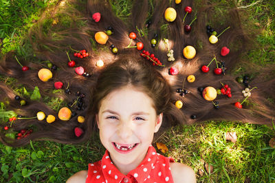 Portrait of a girl lying on the ground