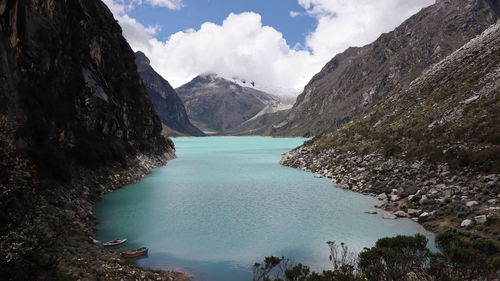 Panoramic view of sea and mountains against sky