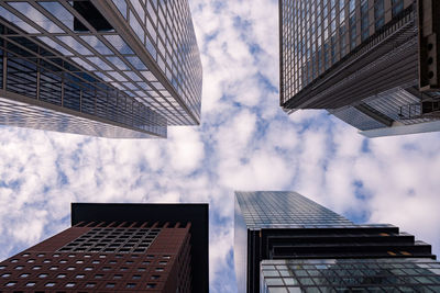 Low angle view of modern buildings against sky