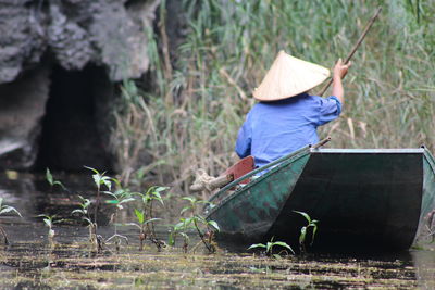 Woman working on grass