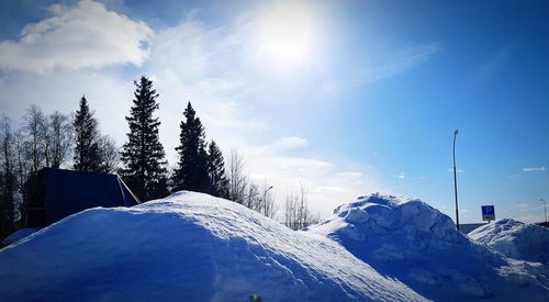 Scenic view of snow covered mountains against sky