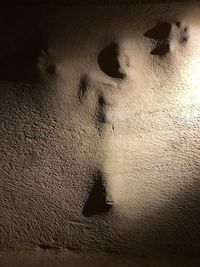 High angle view of footprints on floor