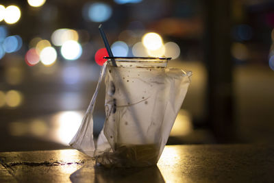 Close-up of wine glass on table