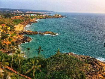 High angle view of sea shore against sky