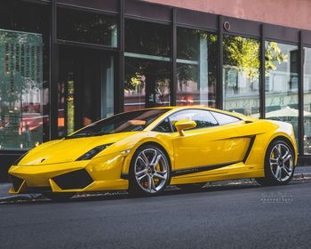 Yellow car on city street