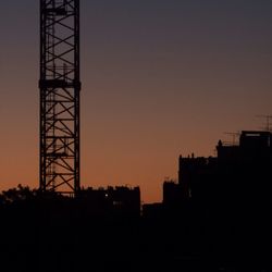 Silhouette of city at sunset