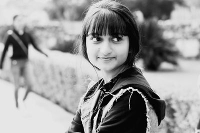 Portrait of smiling girl outdoors