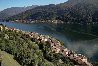 Scenic view of calm lake against mountain range