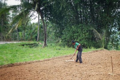 Man working on field