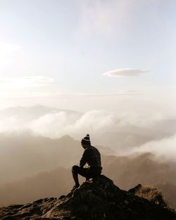 Man sitting on mountain