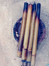 High angle view of paintbrushes in container on table